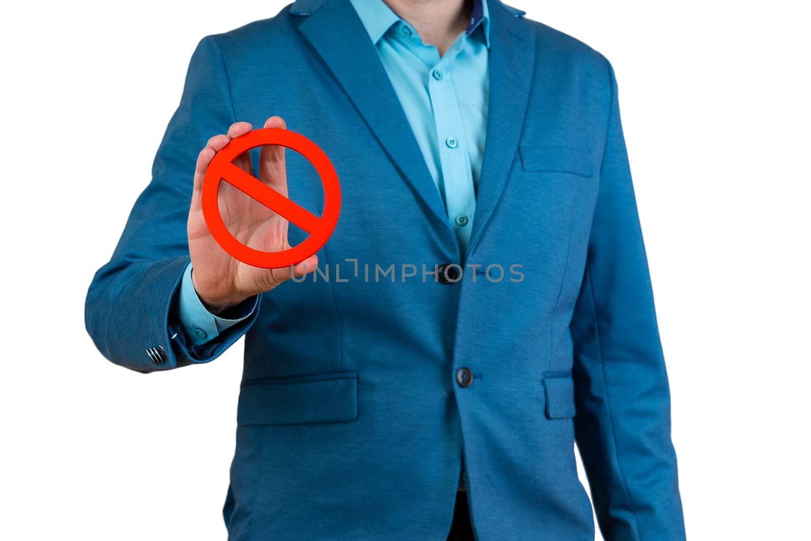 Businessman holds a red NO prohibition symbol