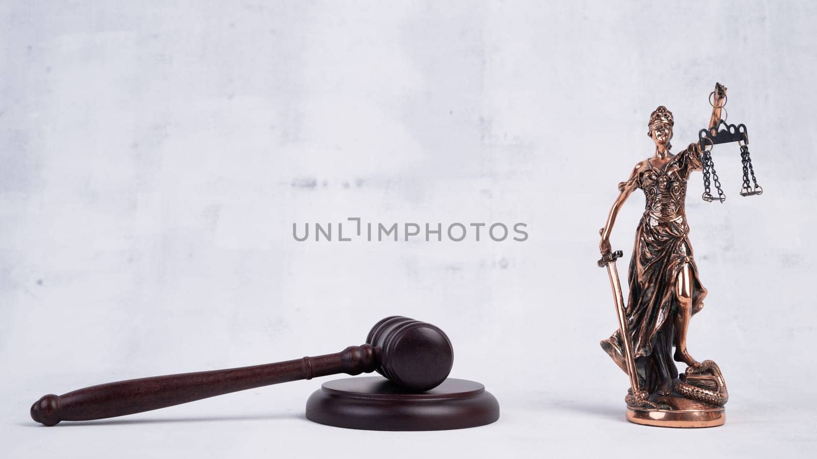 Law concept. Gavel and lady justice by zartarn