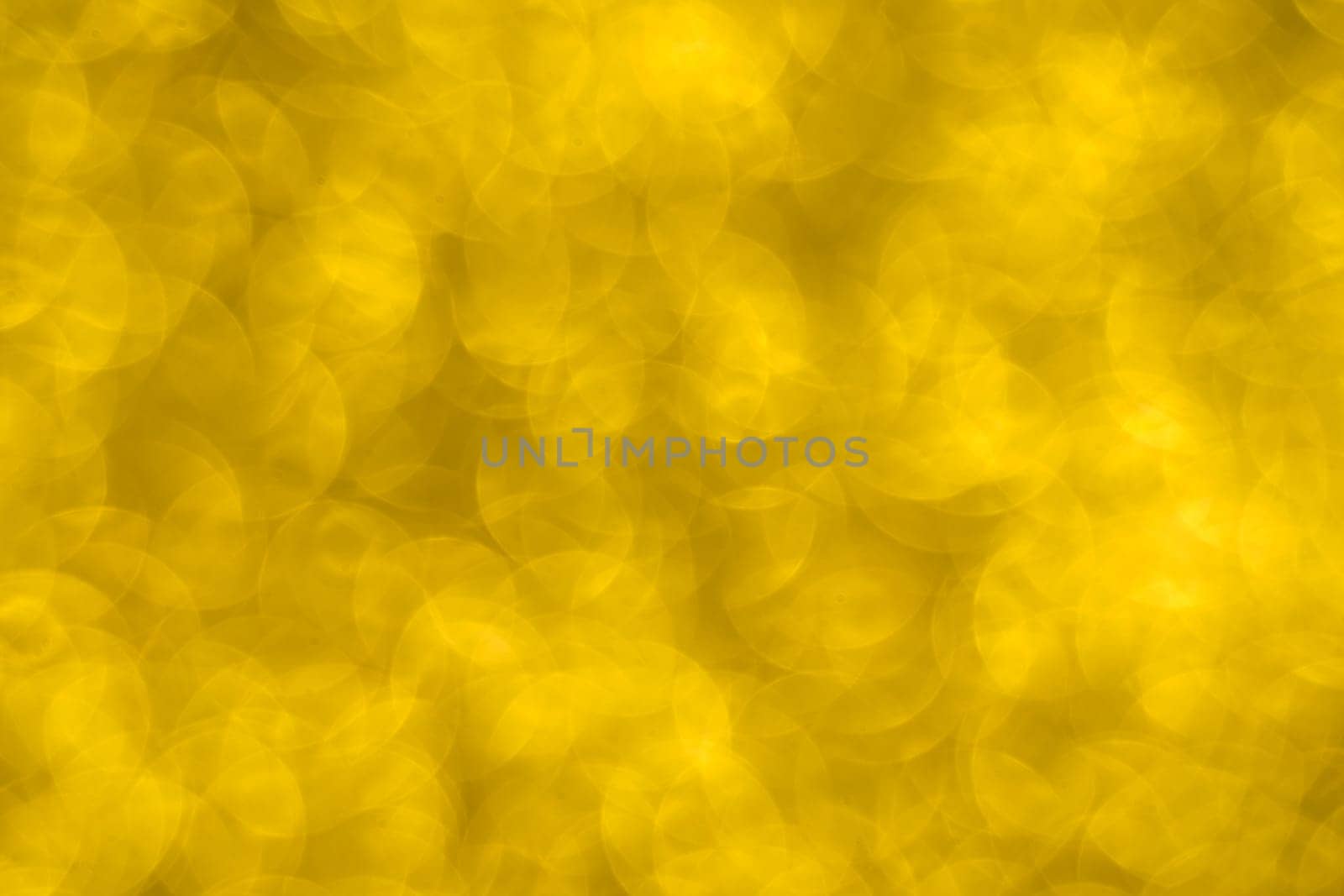 Abstract christmas lights glitter background. christmas gold texture background by zartarn