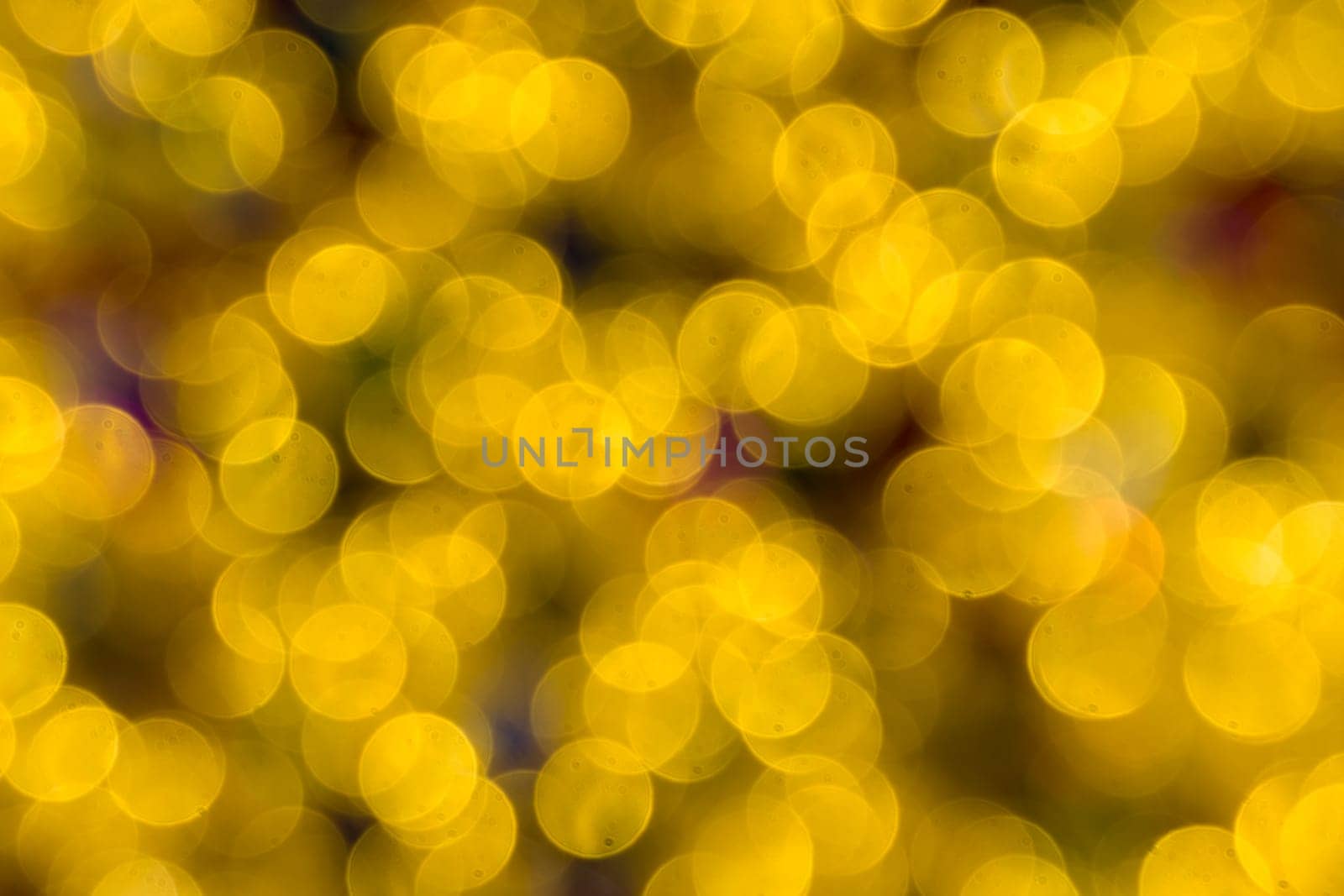 Abstract golden color lights chrismas background. de-focused by zartarn