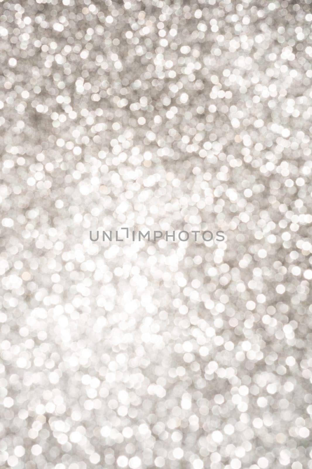 Silver Sparkling Lights Festive background with texture. Abstract Christmas twinkled bright bokeh defocused and Falling stars. by zartarn