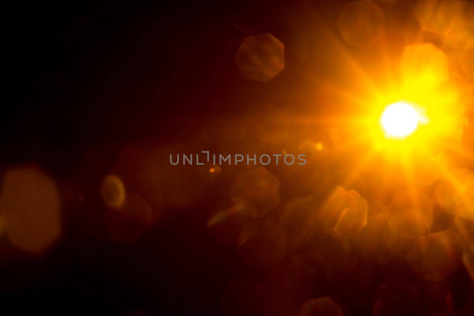 Abstract Natural Sun flare on the black.