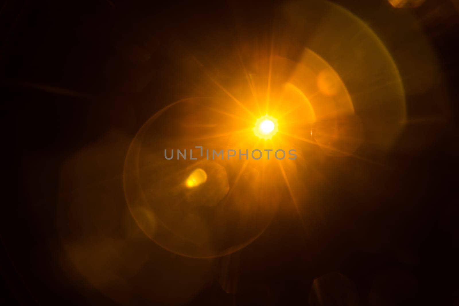 Abstract Natural Sun flare on the black.