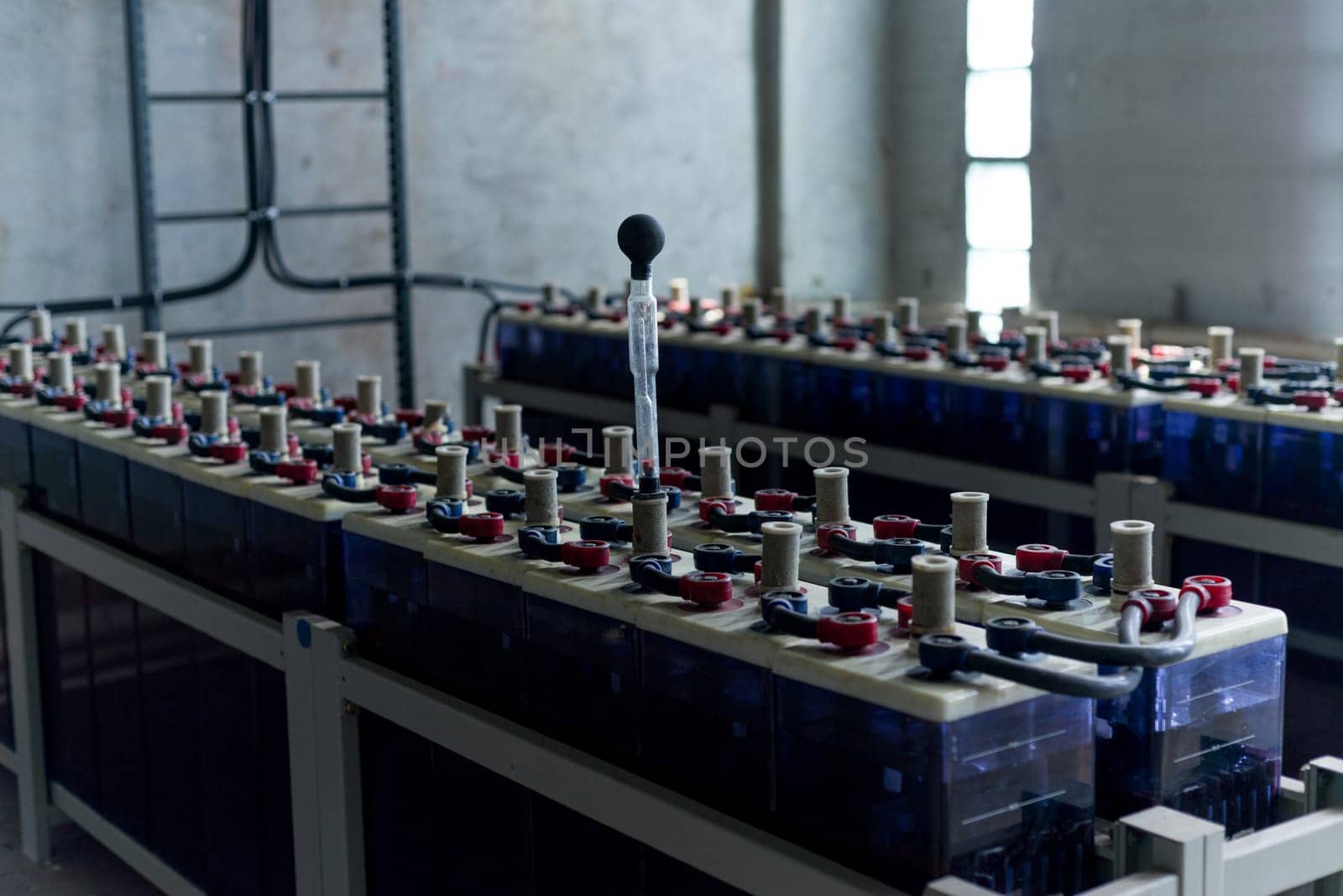 Powerful rechargeable battery forklift. On the surface of the battery is an electrical connector. - image