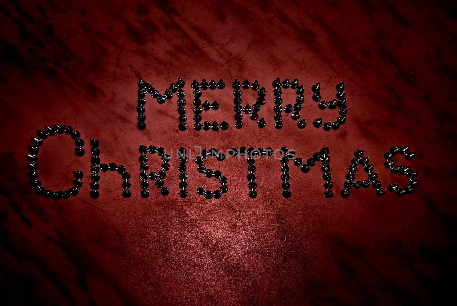 Merry Christmas inscription. In creative execution.