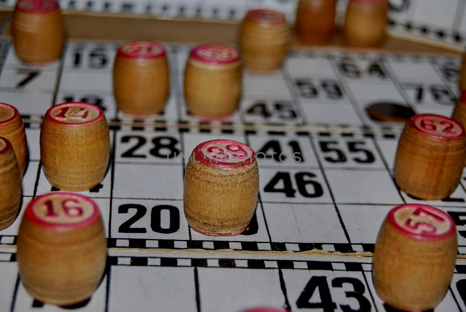 Lotto. Board game. Cards with numbers are covered  with barrels. by Inoxodec