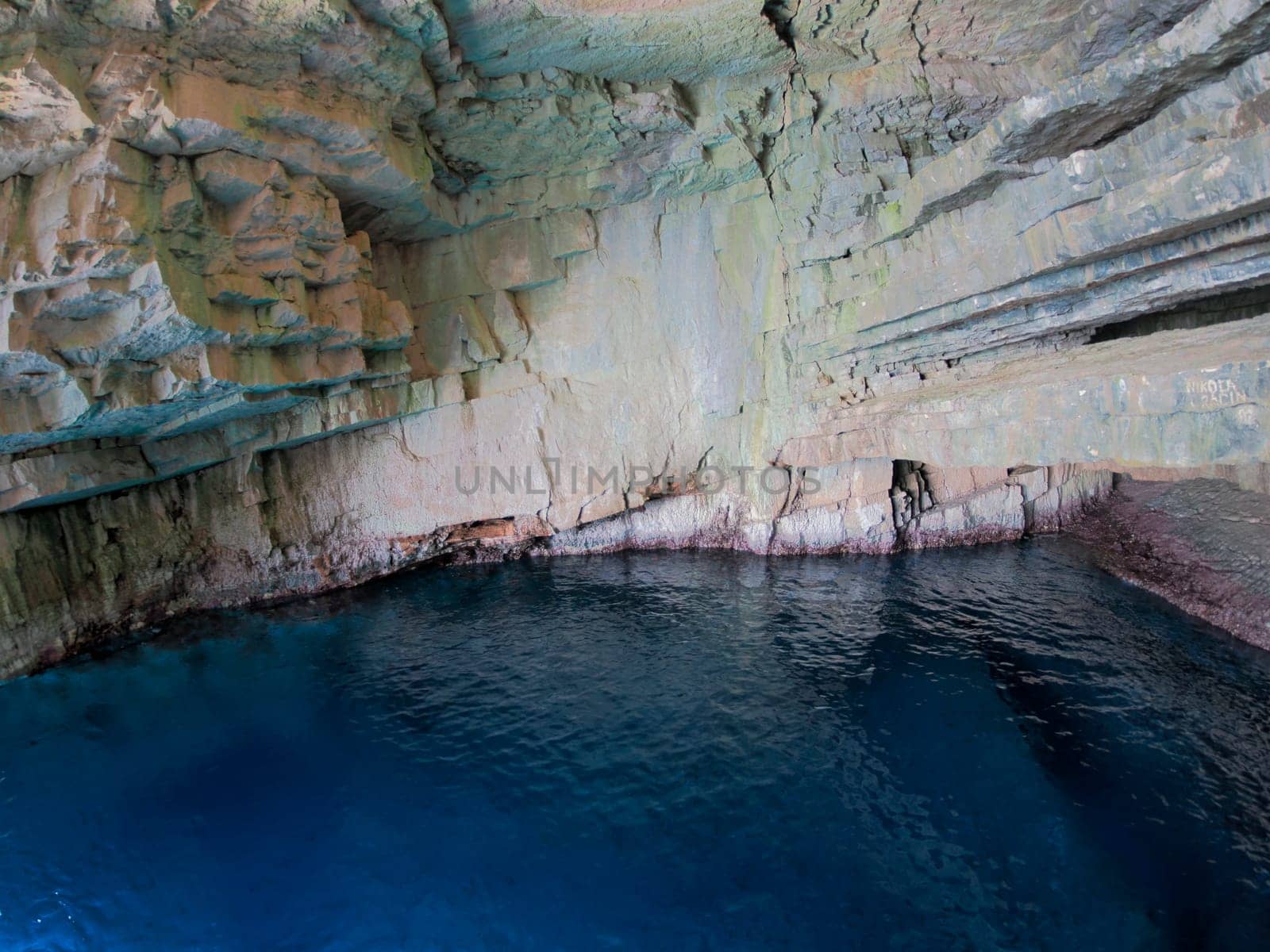 vis island croatia turquoise water and rock cliff, transparent clear sea water during a bright summer day