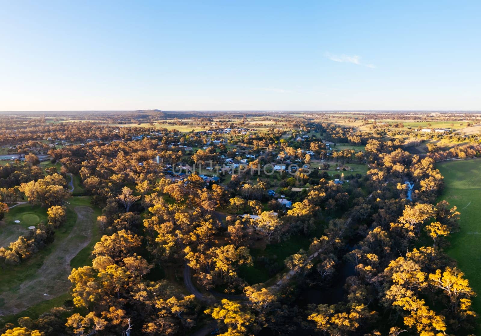 AXEDALE, AUSTRALIA - SEPTEMBER 23: Aerial view of the historic town of Axedale on a warm spring evening in Axedale, Victoria, Australia in 2023