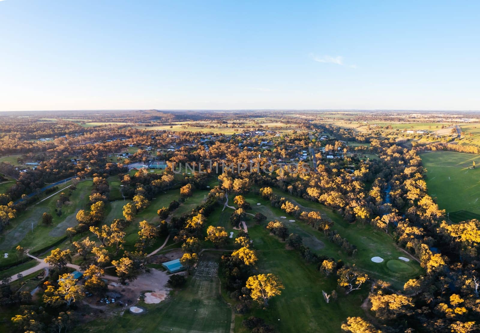 AXEDALE, AUSTRALIA - SEPTEMBER 23: Aerial view of the historic town of Axedale on a warm spring evening in Axedale, Victoria, Australia in 2023