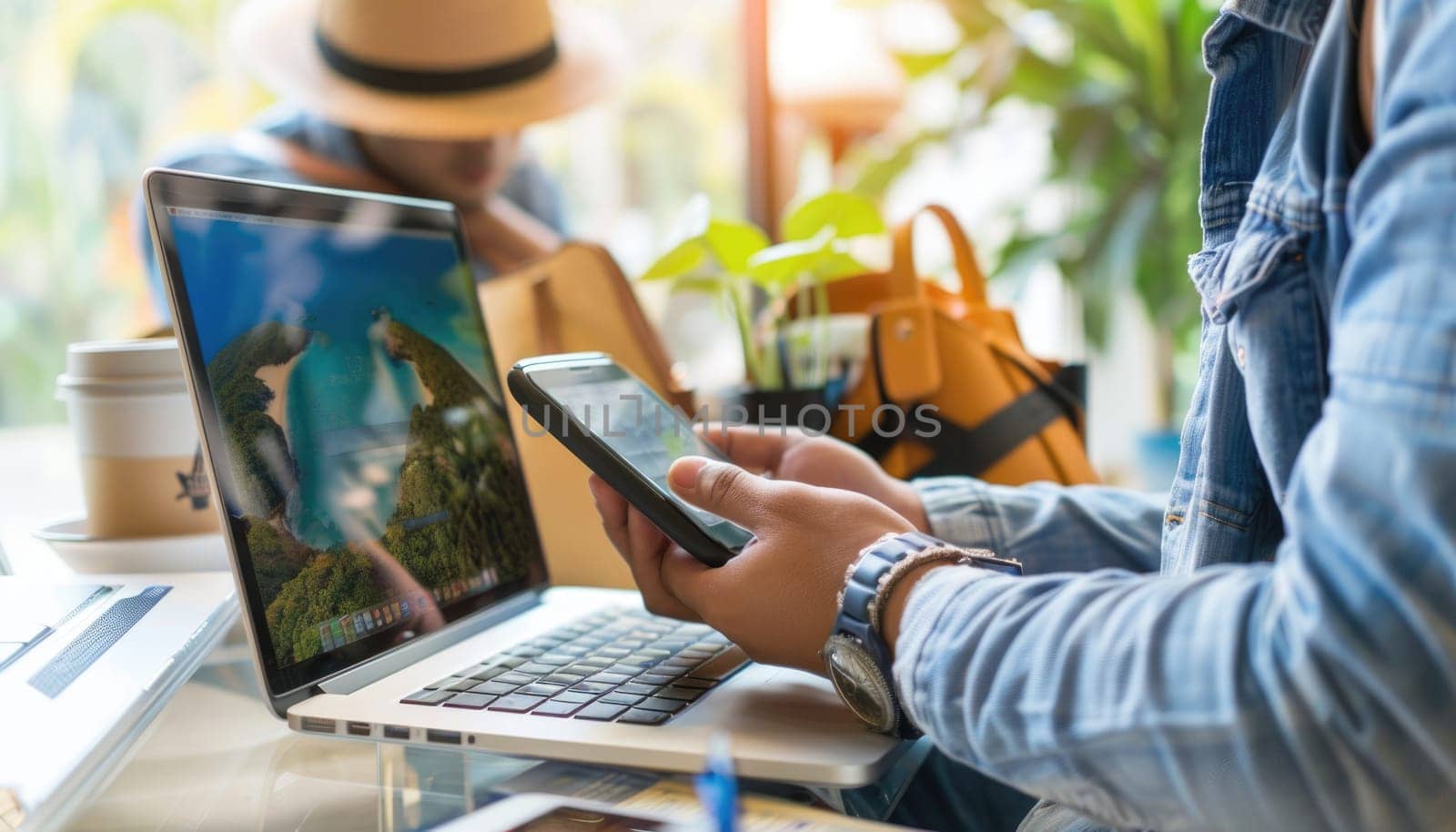 A man is using a laptop and a cell phone by AI generated image.