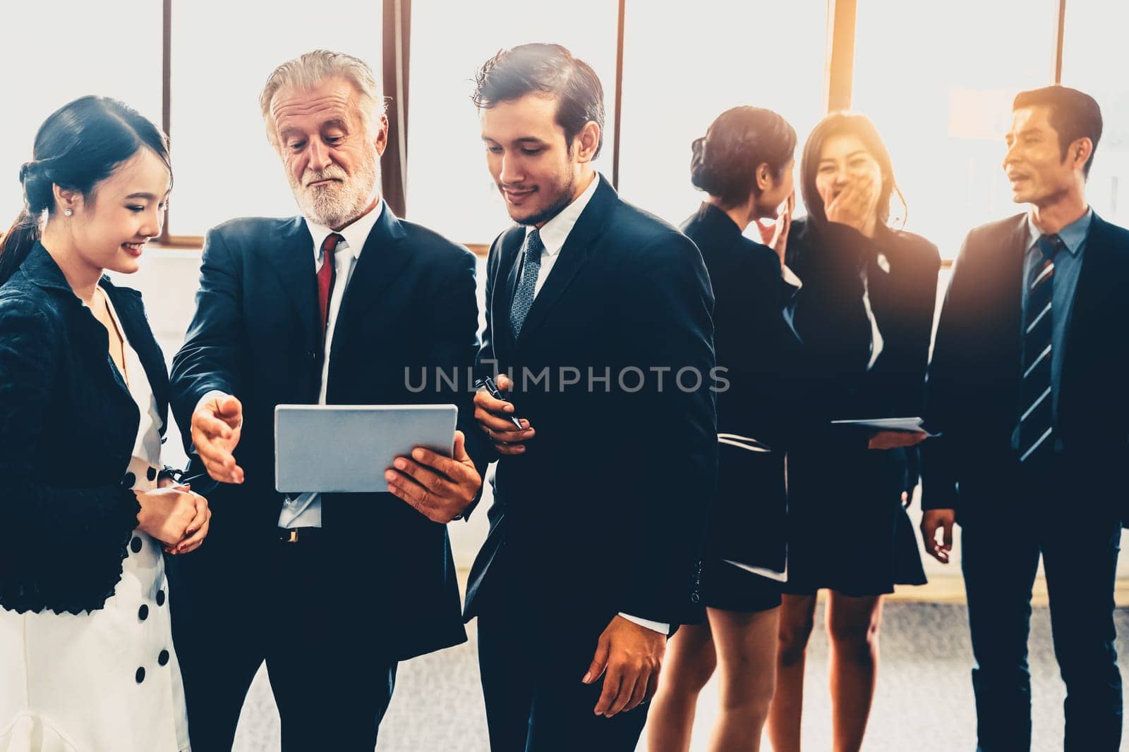 Many young businessmen and businesswomen in group meeting standing at conference hall in office. Multicultural company organization unity and support. Concept of partnership and human resources. uds