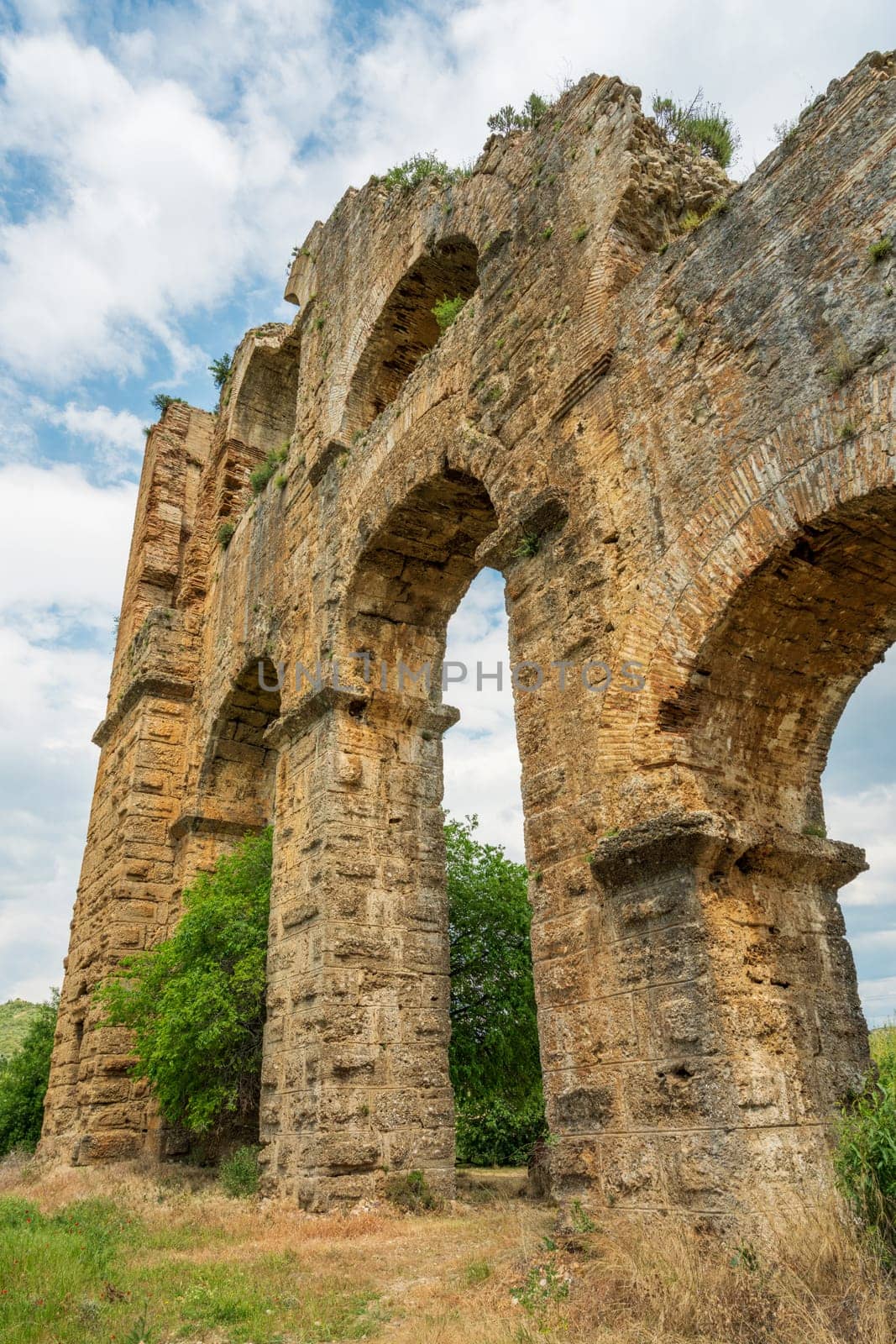 Aqueducts in the ancient city of Aspendos in Antalya, Turkey by Sonat