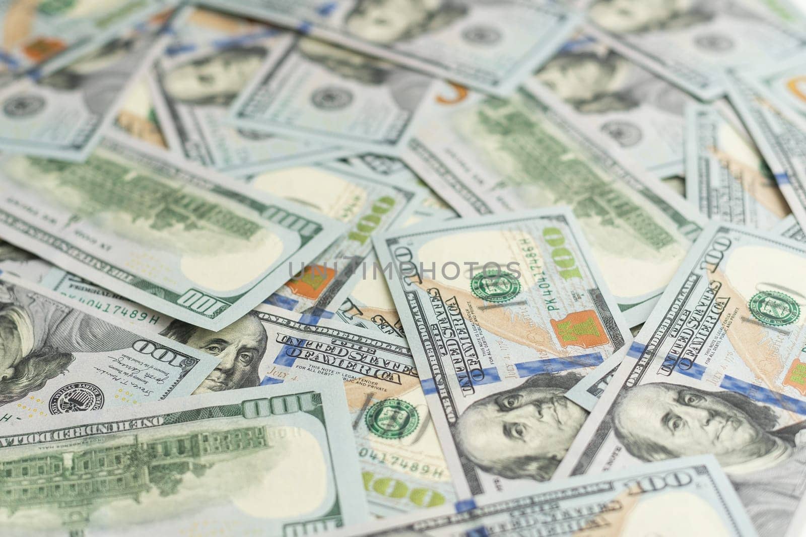 Texture of dollar bills. One hundred dollars. Close-up. High quality photo