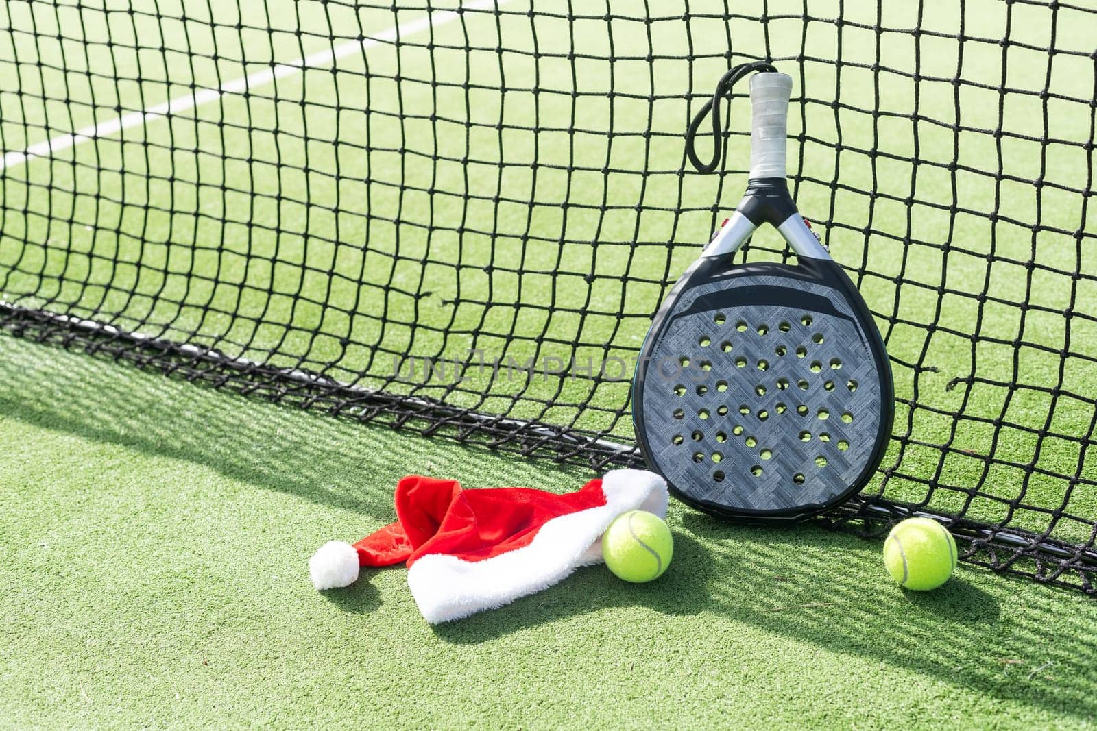 padel racket and santa hat. High quality