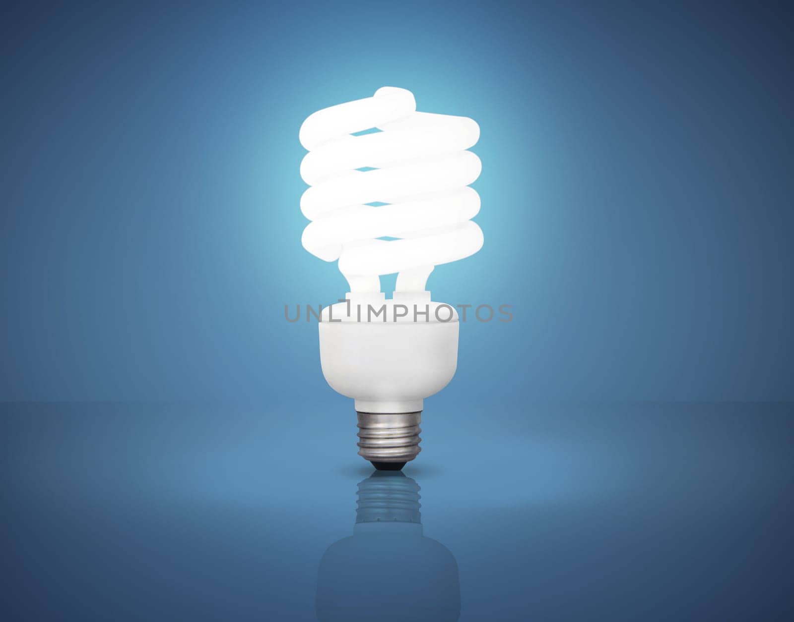 Lightbulb, power and electricity in studio for idea with mockup space for inspiration, solution or genius thought. Energy, glow light and science for knowledge or creative thinking on blue background.