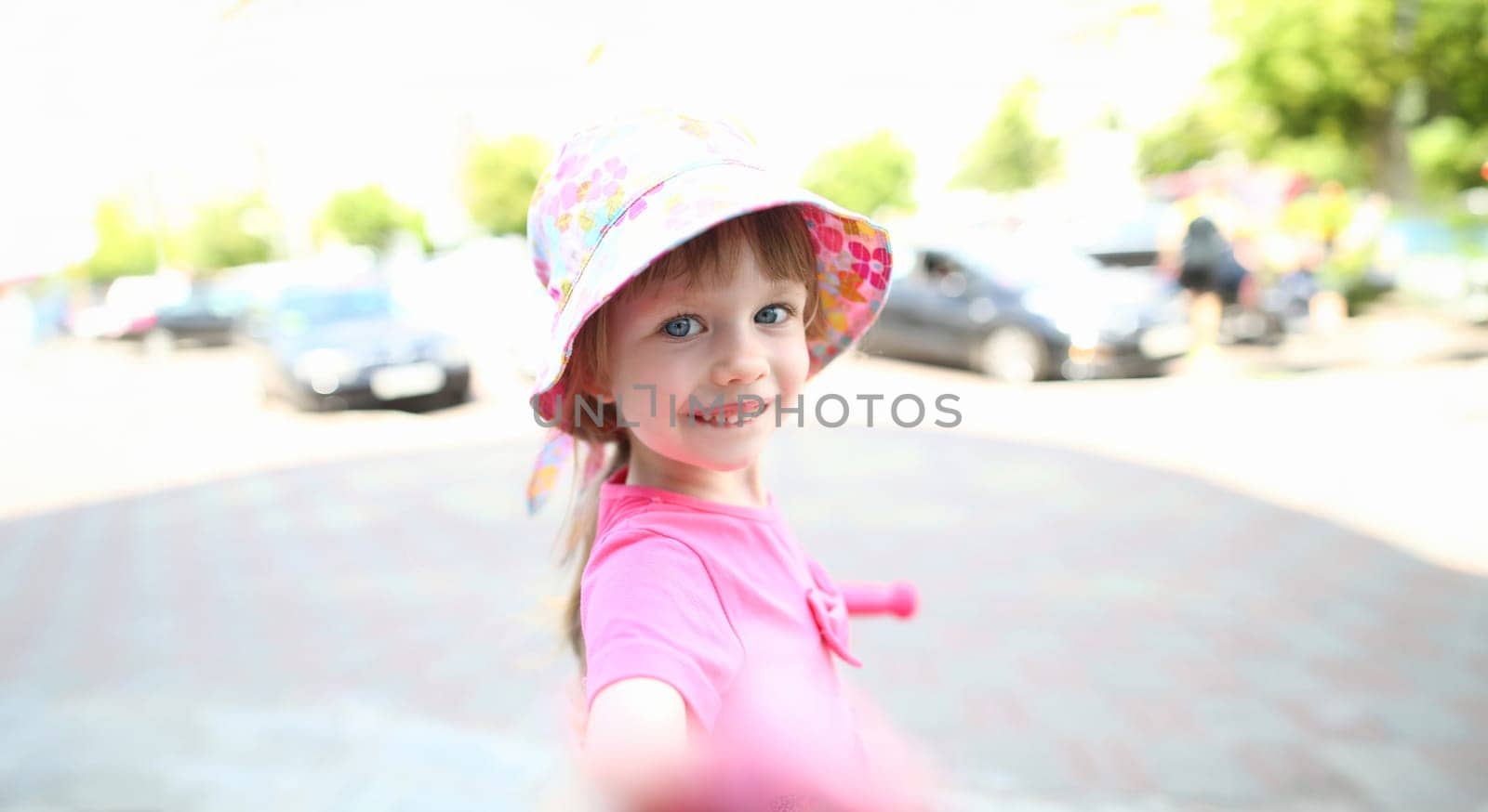 Happy little child make selfie smartphone outdoor by kuprevich