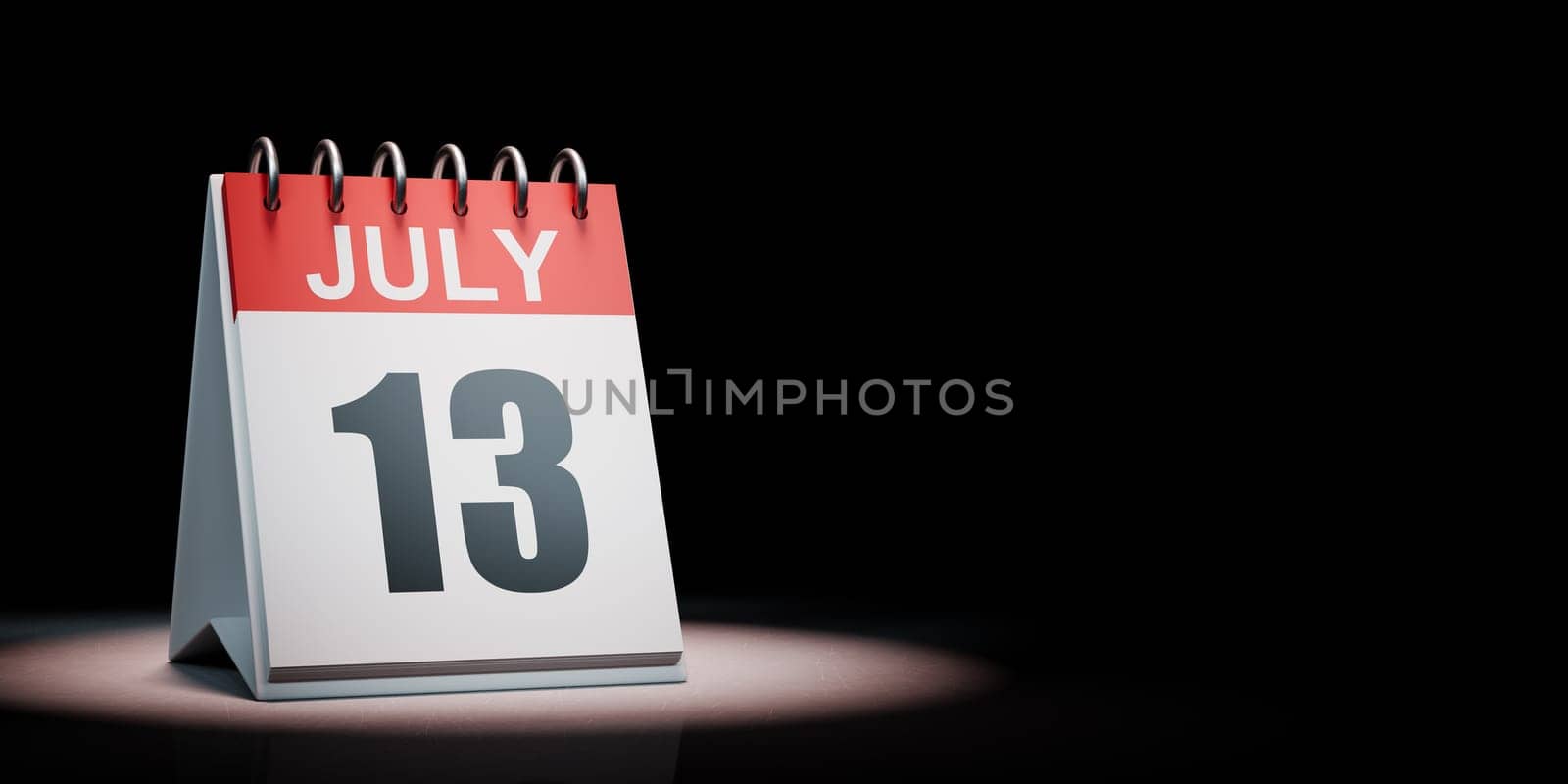 July 13 Calendar Spotlighted on Black Background by make