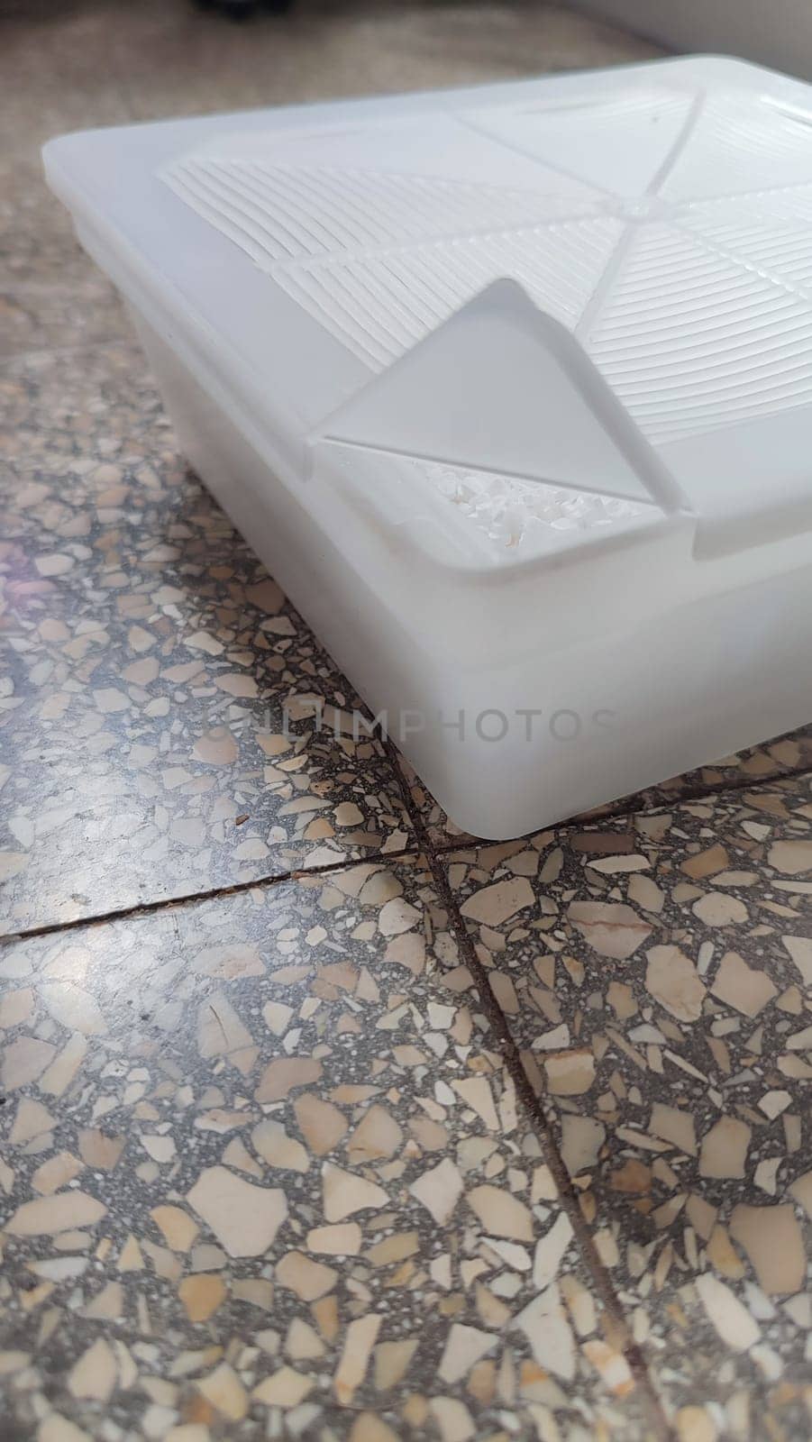 white plastic container, moisture absorber by Ply