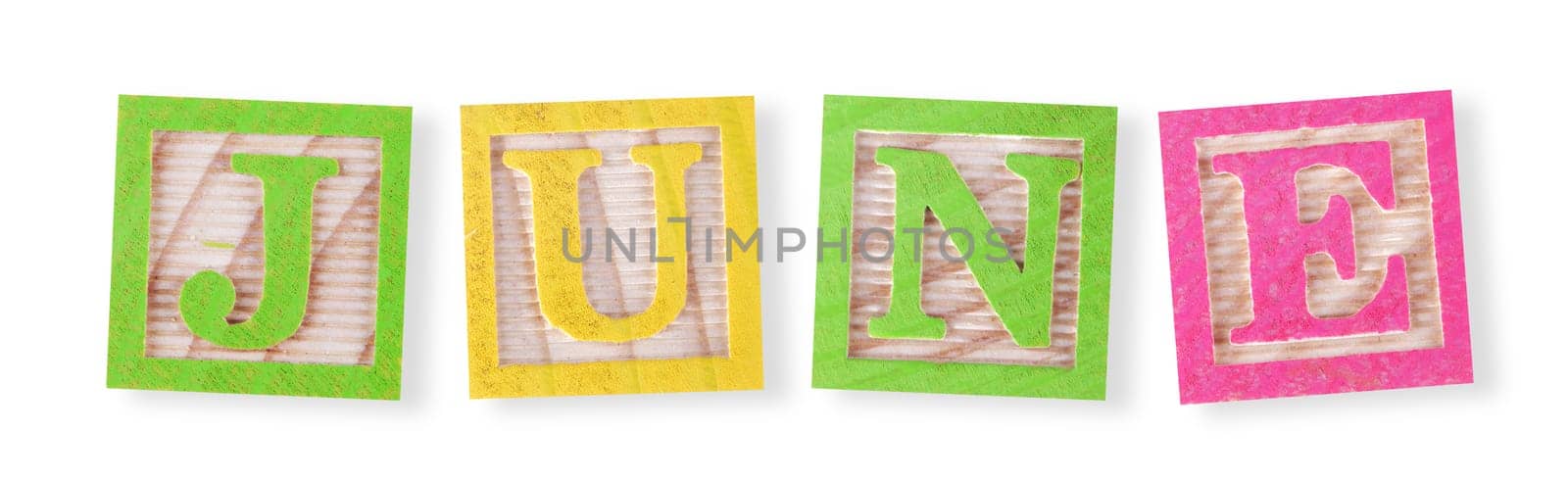 A June concept with childs wood blocks on white with clipping path to remove shadow