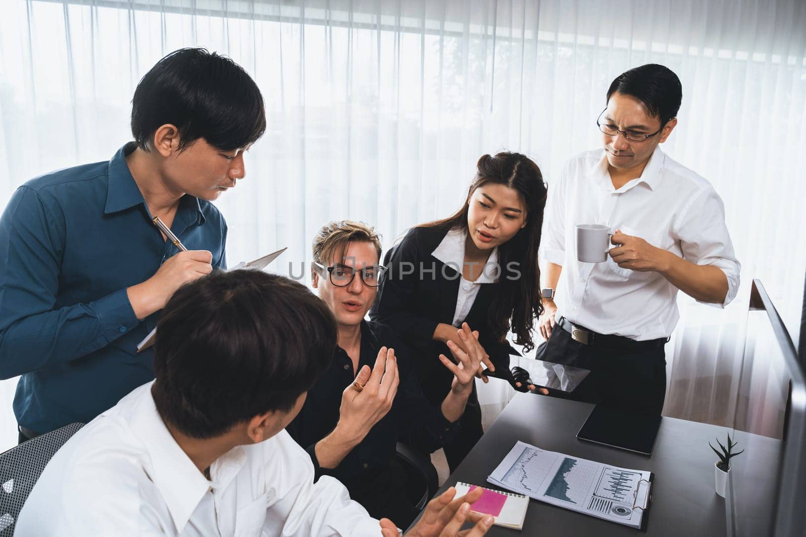 Group of diverse office worker employee working together on strategic business marketing planning in corporate office room. Positive teamwork in business workplace concept. Prudent