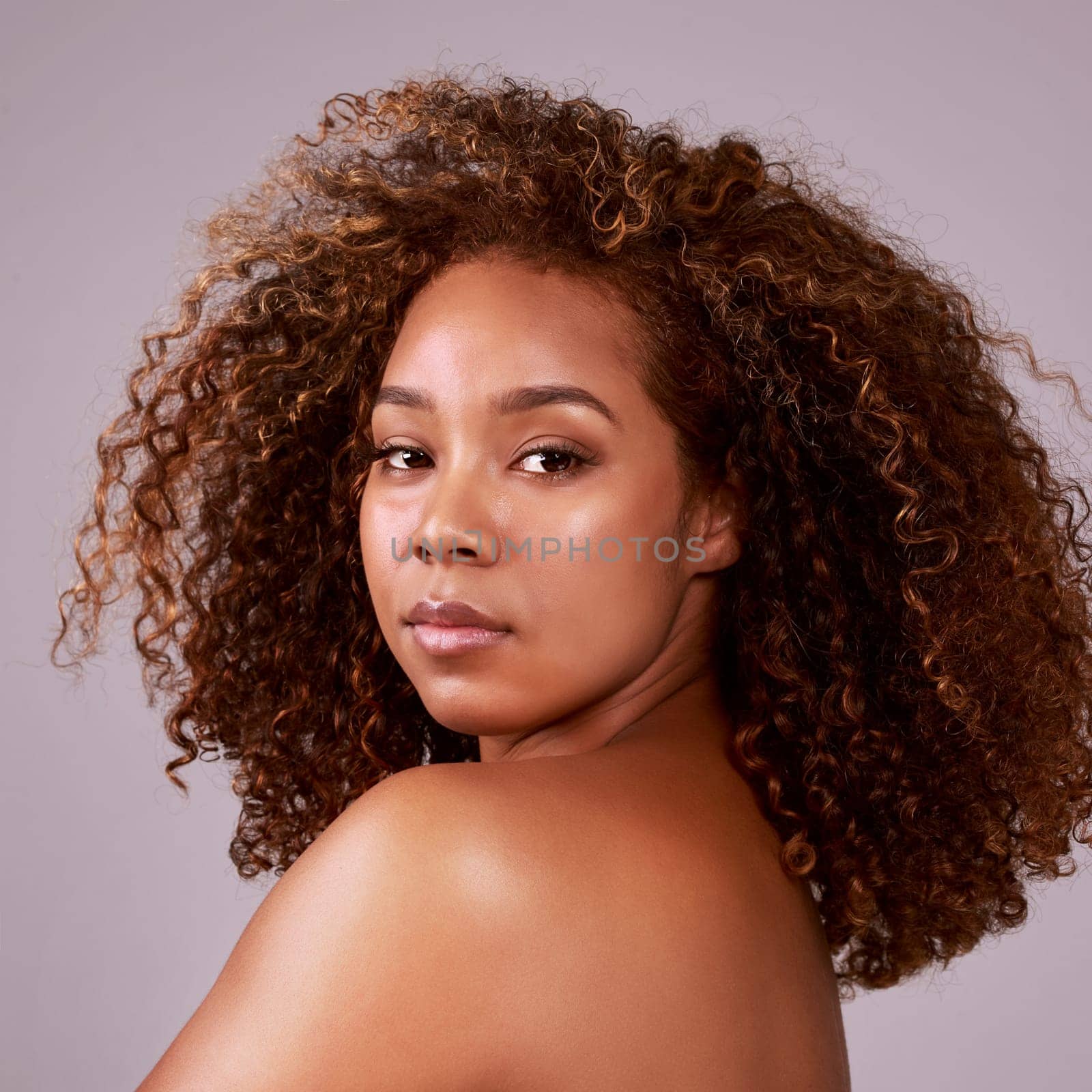 Skincare, portrait and African girl in studio with wellness, cosmetics and glowing skin results on grey background. Beauty, face and model with dermatology, shine and soft natural makeup aesthetic by YuriArcurs