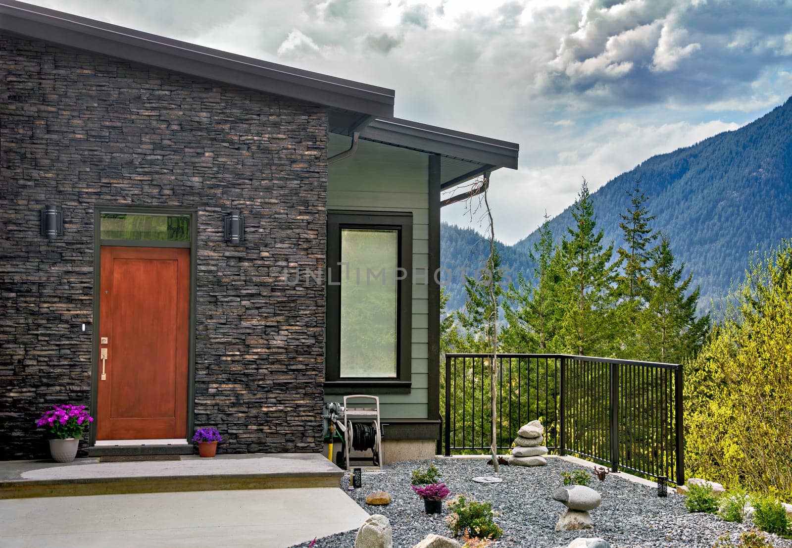 Entrance of residential house in a picturesque location overlooking the mountains.