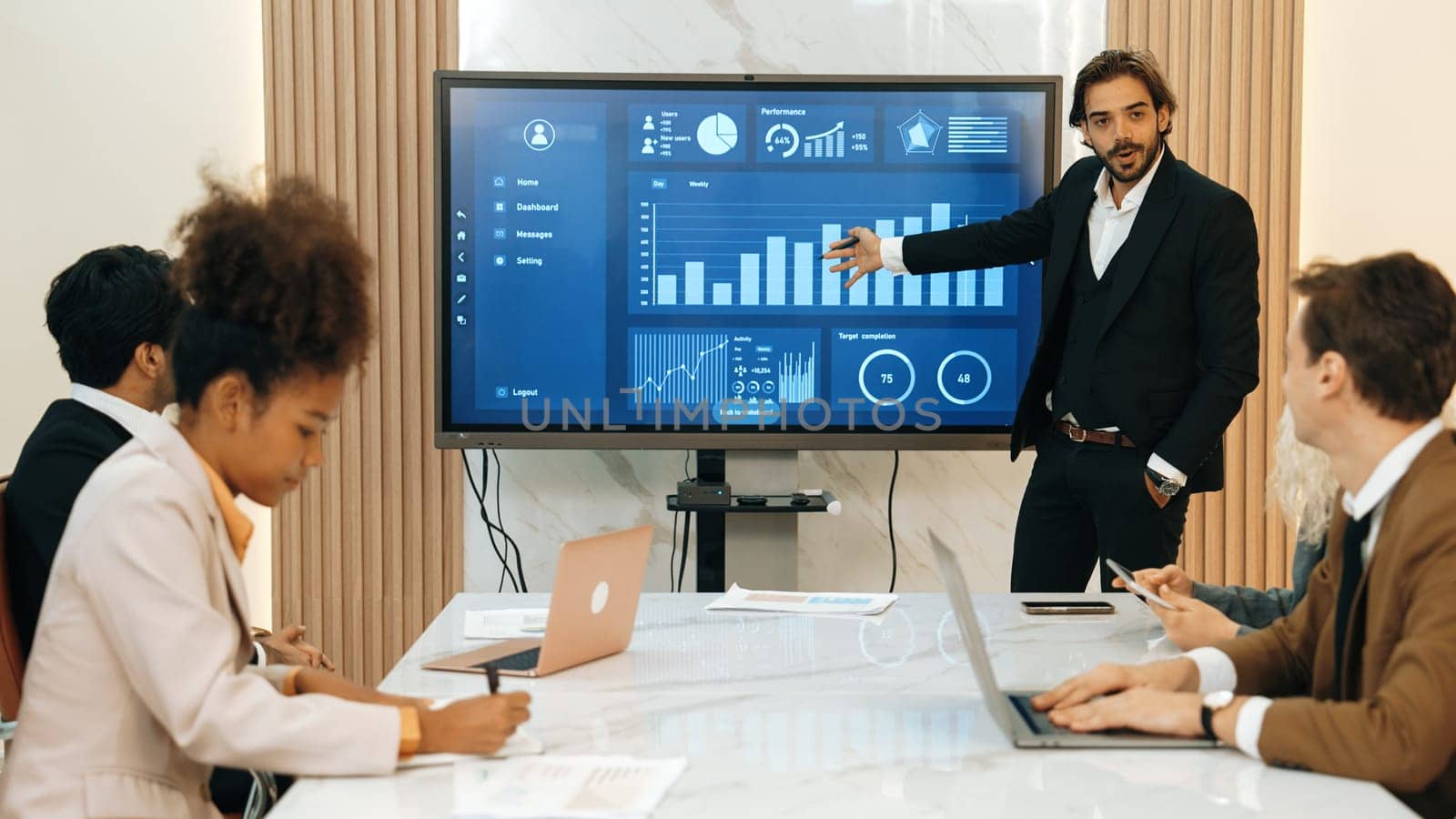 Presentation in office or ornament meeting room with analyst team utilize BI Fintech to analyze financial data. Businesspeople analyzing BI dashboard power display on TV screen for strategic planning