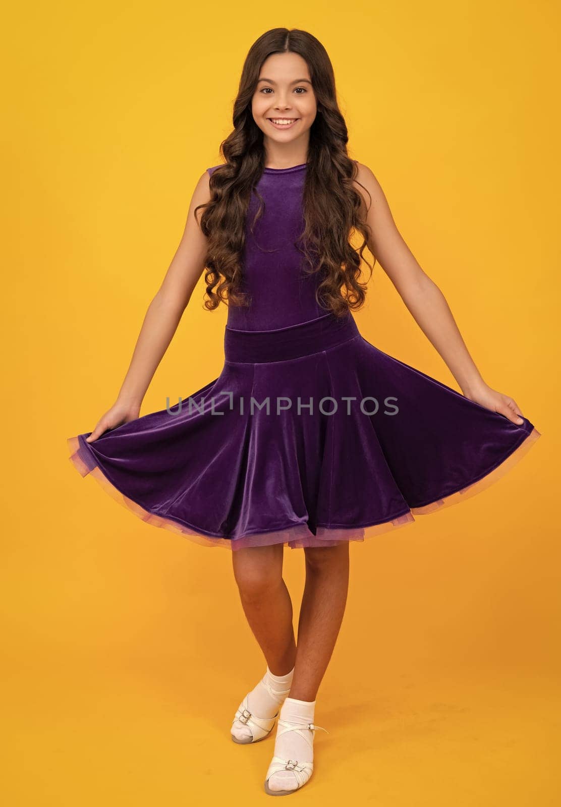 Full length of teenager child girl wearing ball dress. Happy girl face, positive and smiling emotions. by RedFoxStudio