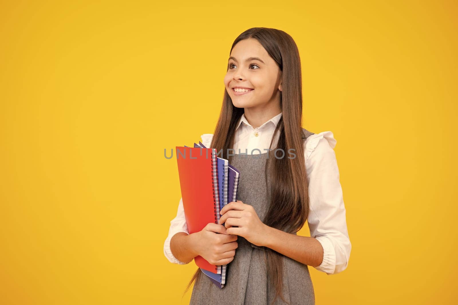Back to school. Portrait of teenage school girl with books. Children school and education concept. Schoolgirl student. by RedFoxStudio