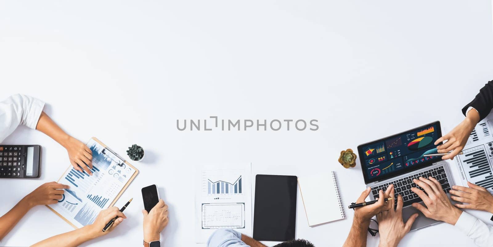 Group of office worker and businesspeople working on business financial data analysis. Empty space with editable blank background meeting table for customer design. Prudent