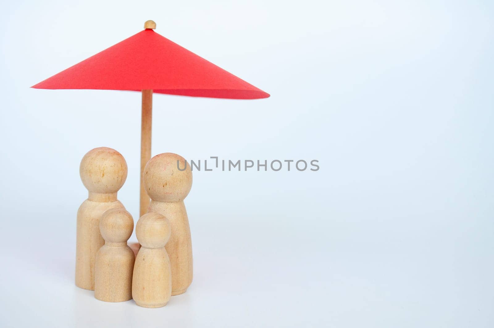 Red umbrella and wooden family doll figures with customizable space for text.