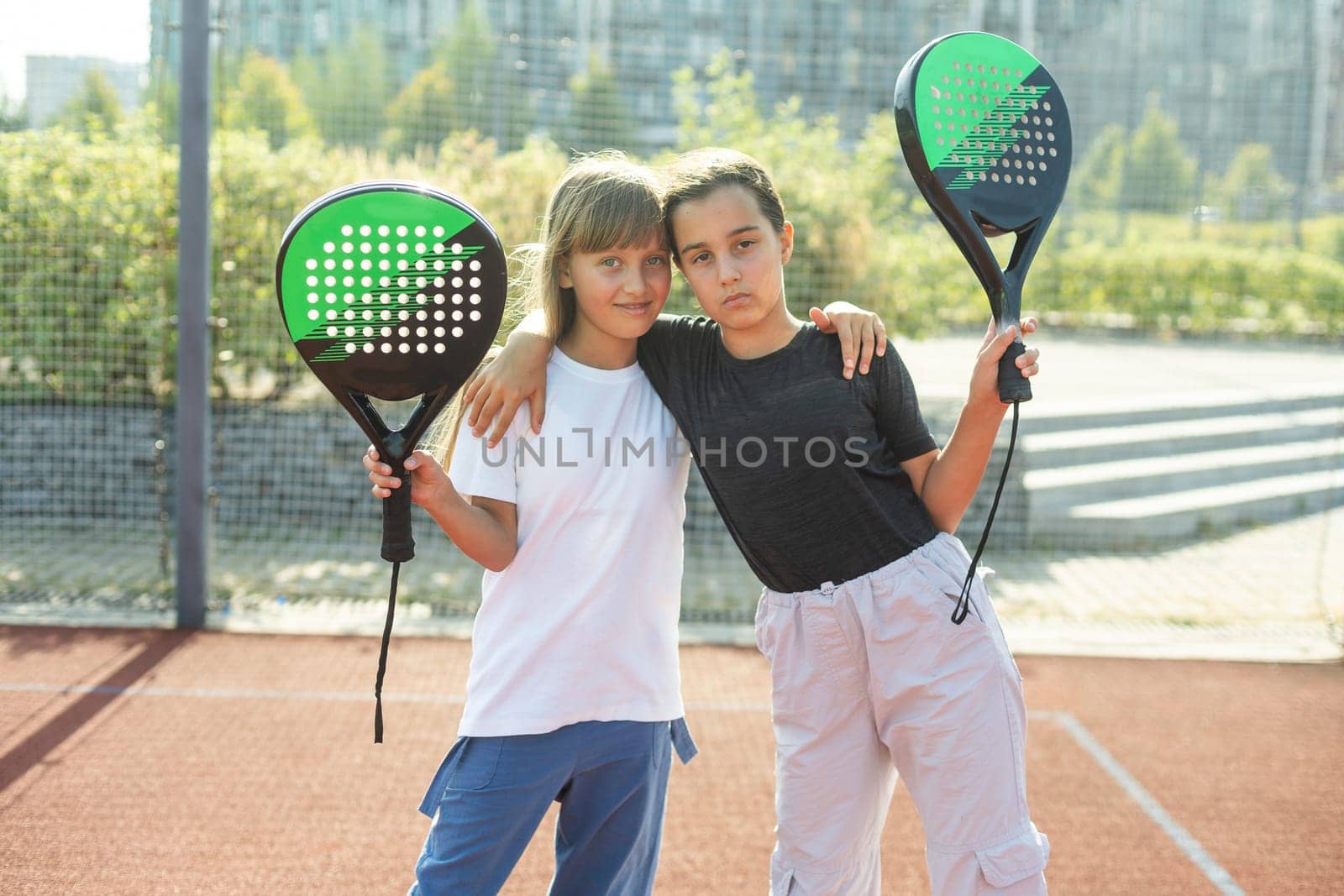 little Girl playing paddle tennis. High quality photo