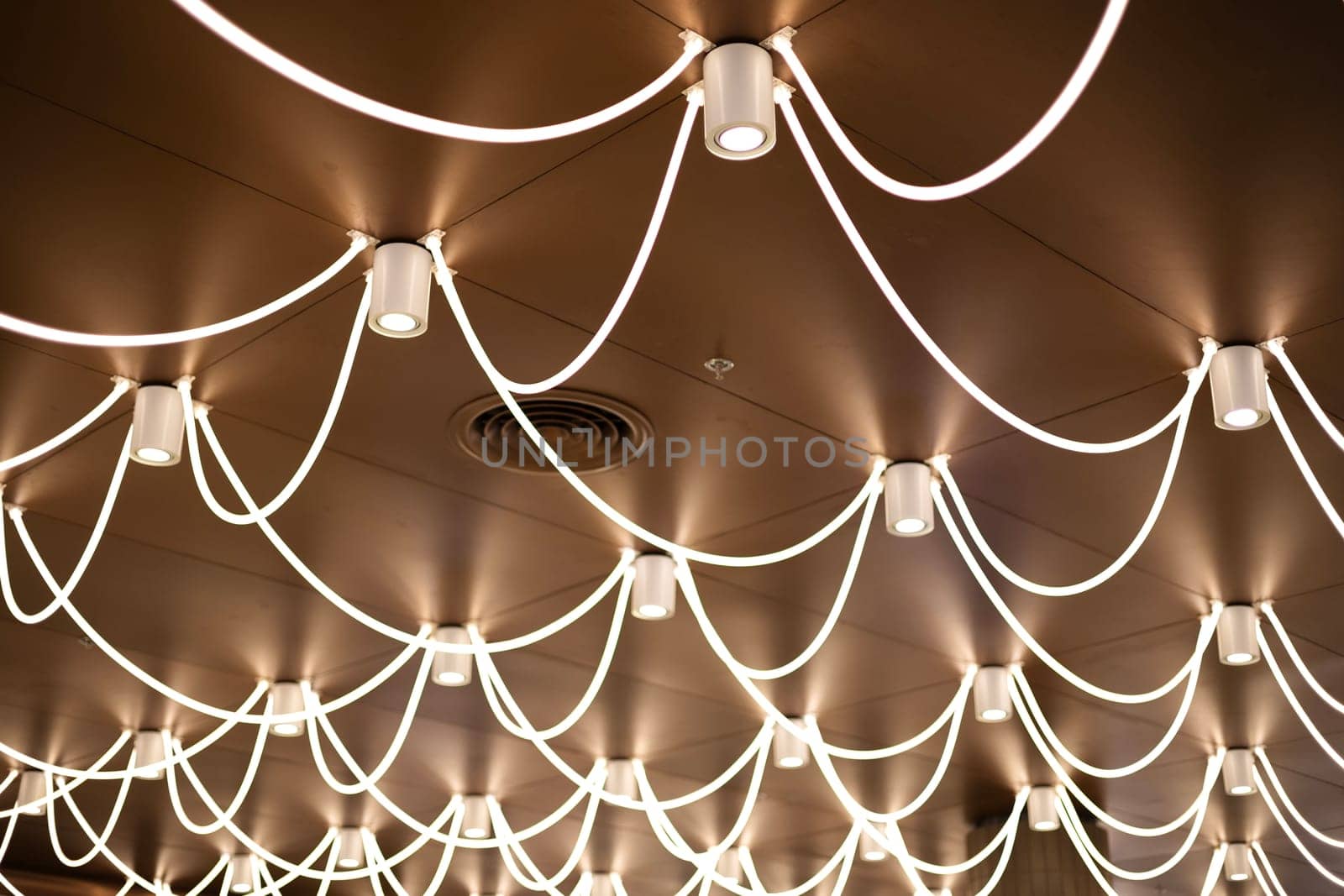 Smoke detector and LED ceiling lights. Ceiling moldings with an intricate crown in the inner corner.