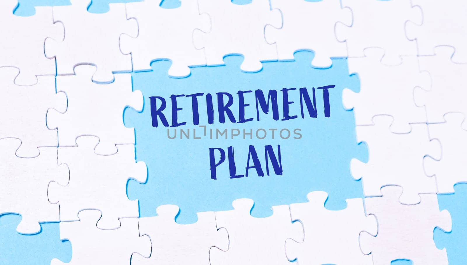 A puzzle piece with the words retirement plan written in blue, representing the importance of thoughtful financial preparation for the future.