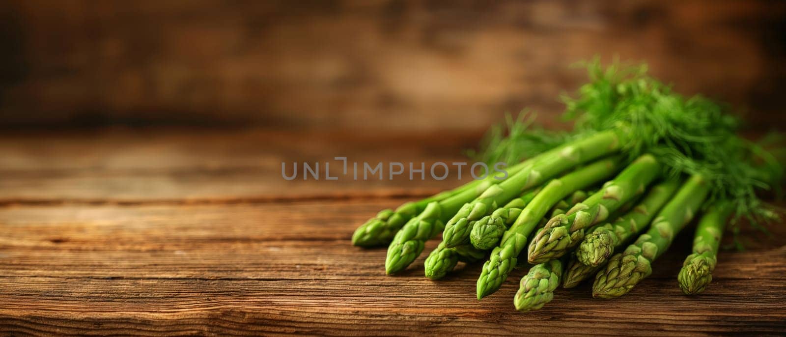 Green asparagus on an abstract background. by Fischeron