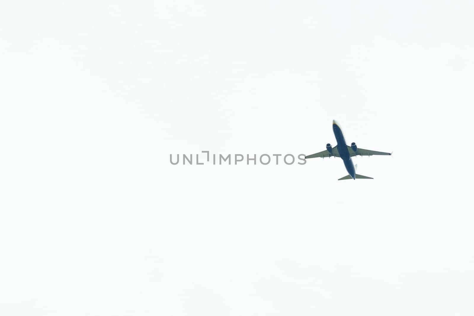 Blue and White Airplane Flying in the Sky by Sd28DimoN_1976