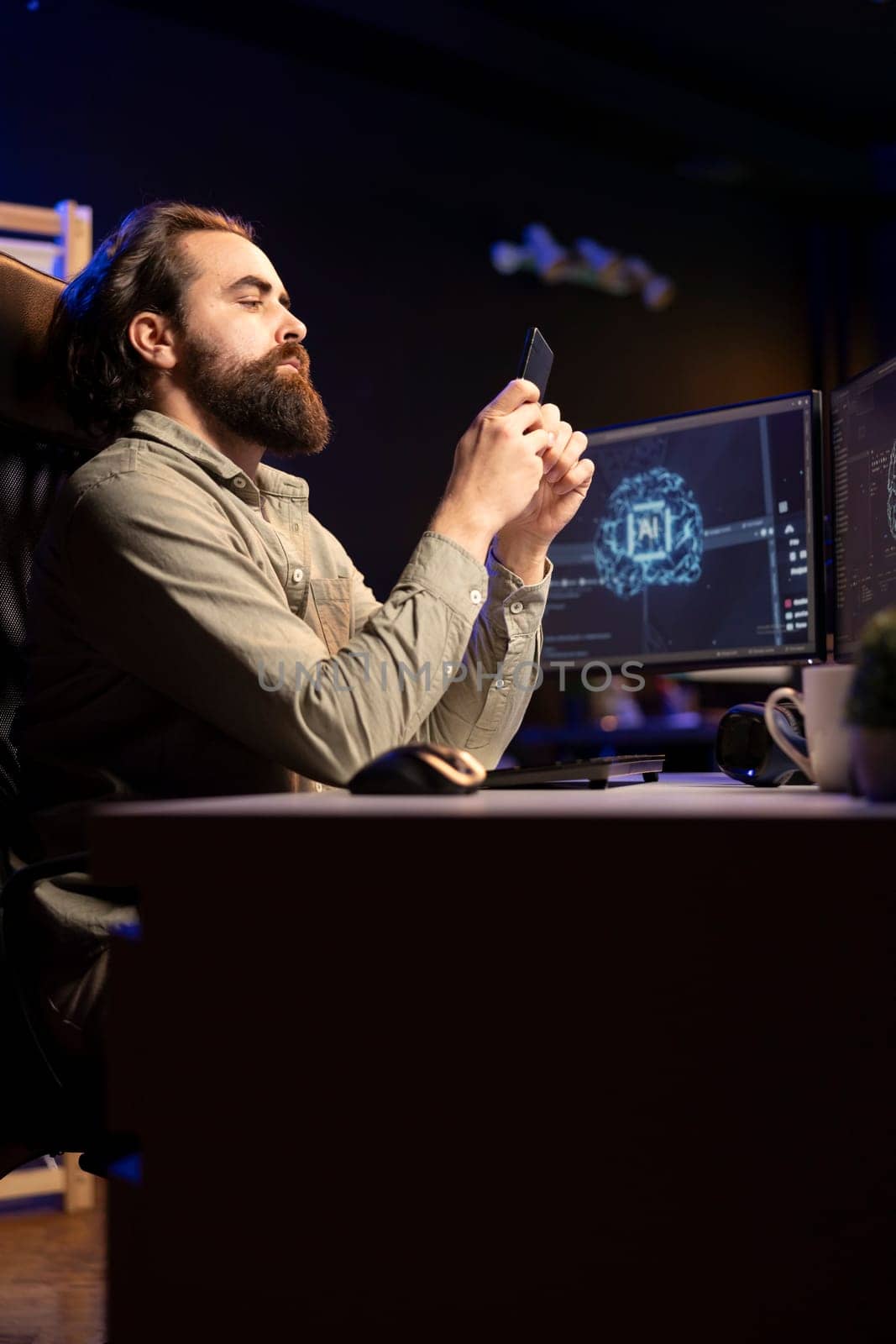 Software engineer inserting disk into PC containing AI machine learning data by DCStudio