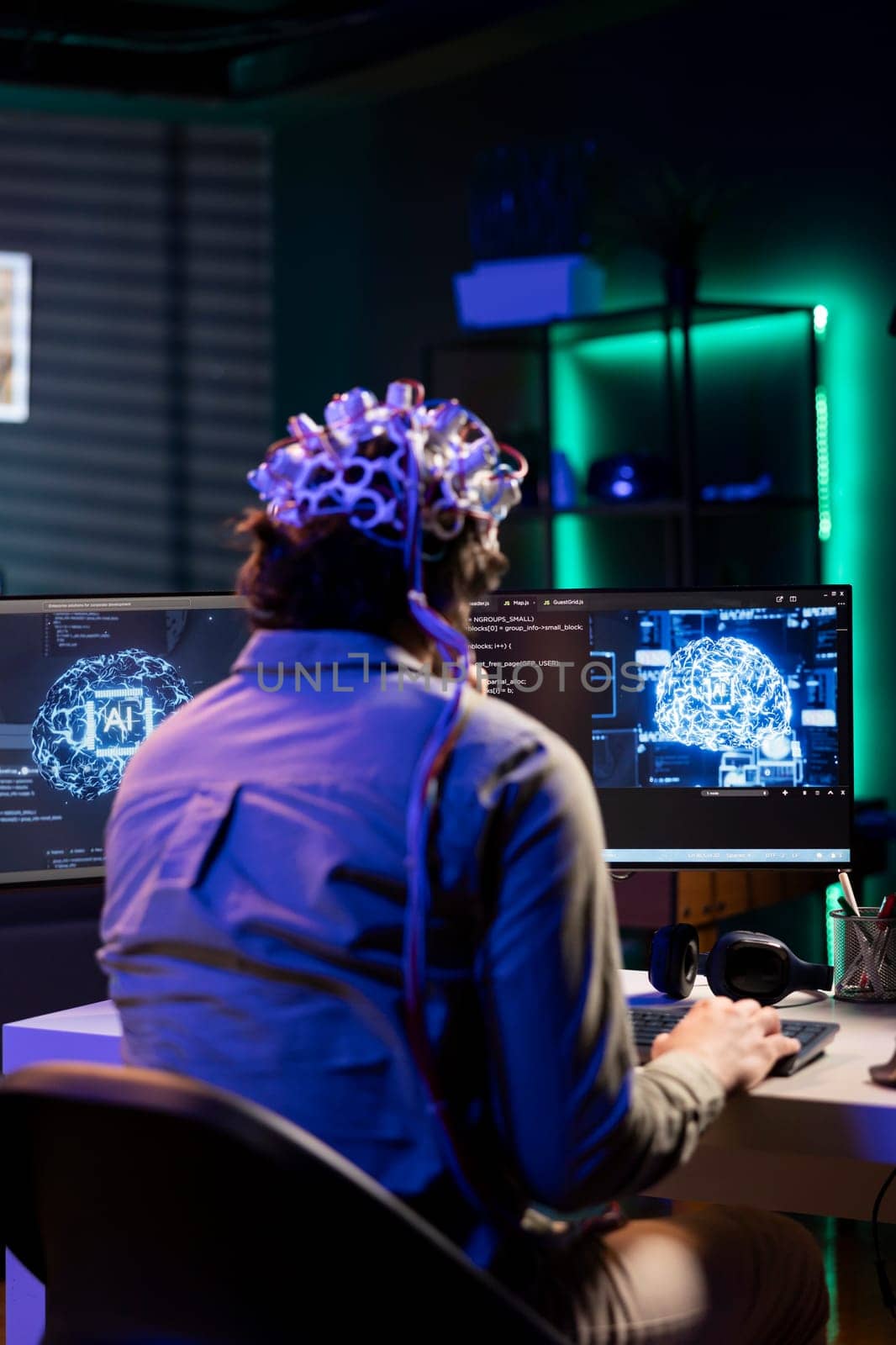 IT expert using neuroscience and EEG headset to gain digital soul by DCStudio