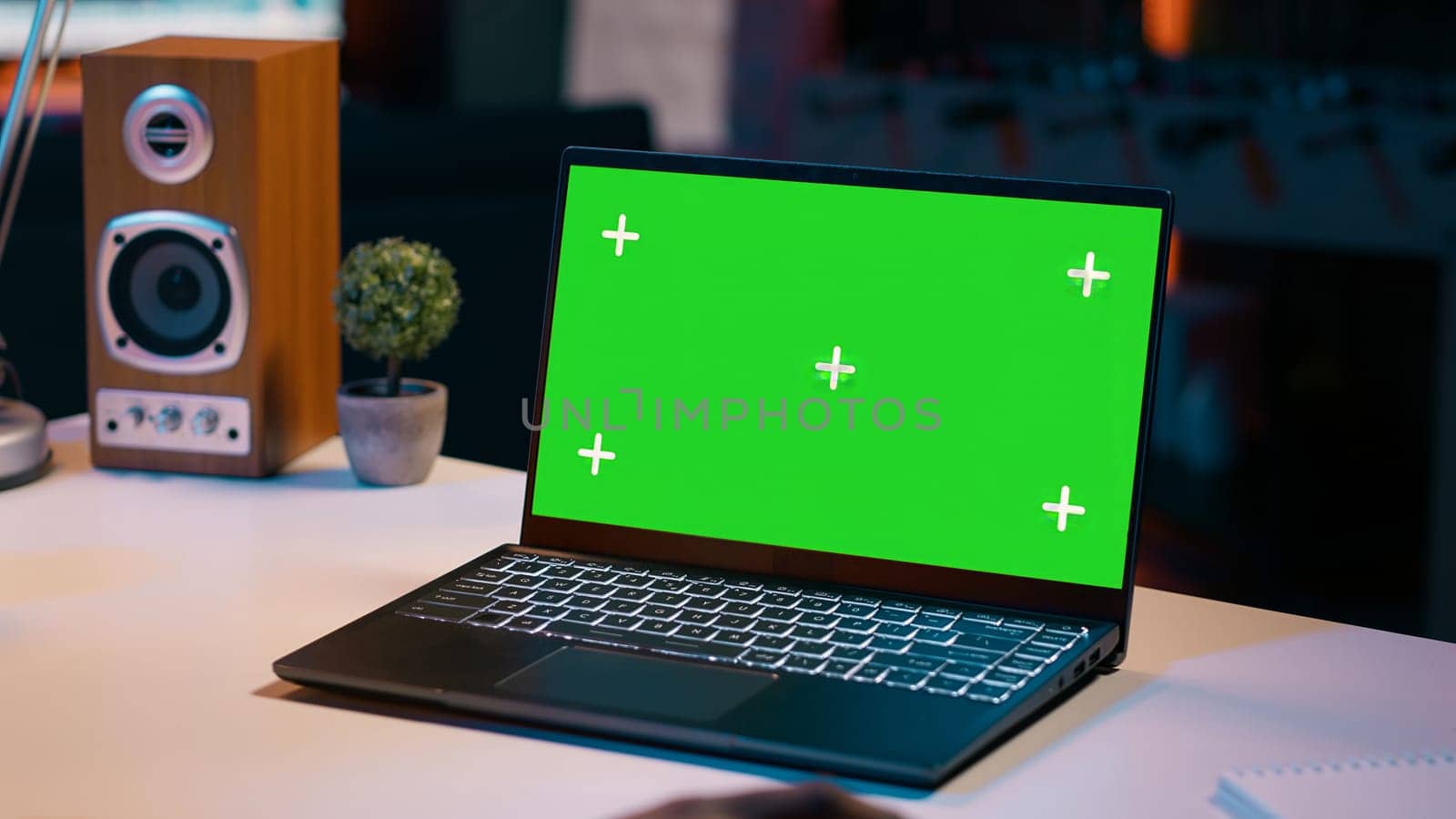 University student checks greenscreen display on laptop at home, improving her education and using isolated chromakey layout on wireless device. Girl looks at mockup screen. Camera A.