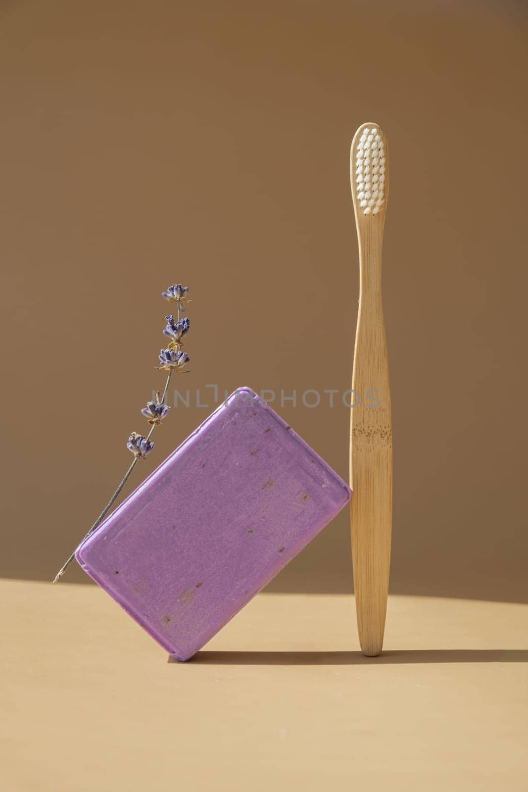 Zero waste bamboo toothbrush and Handcrafted purple lavender soap with lavender flowers. Natural hydrating moisturiser softness cosmetic. Organic calming beauty skincare product. Herbal self care wellness alternative soap by anna_stasiia