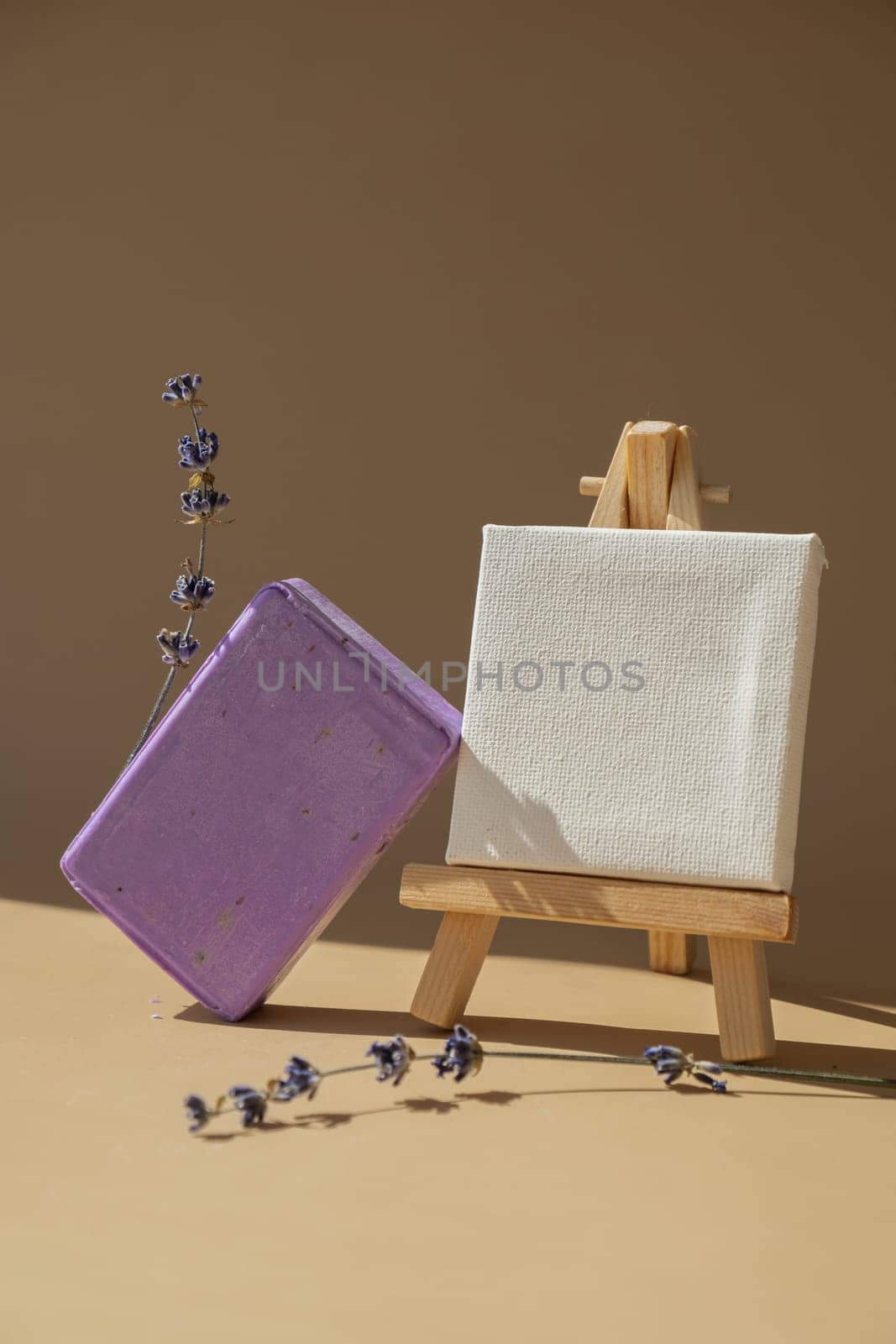 Paper note template mock up copy space Handmade aromatic spa lavender soap. Natural additives and extracts. Bar of lavender soap with dried flowers. Beauty treatment product herbal ecological organic cosmetics. Copy space
