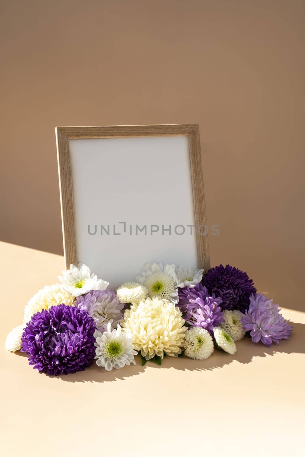 Holiday postcard greeting card photo frame empty paper note around mixed colorful flowers. Copy space mockup template. Minimalistic isometric style Advertisement sample