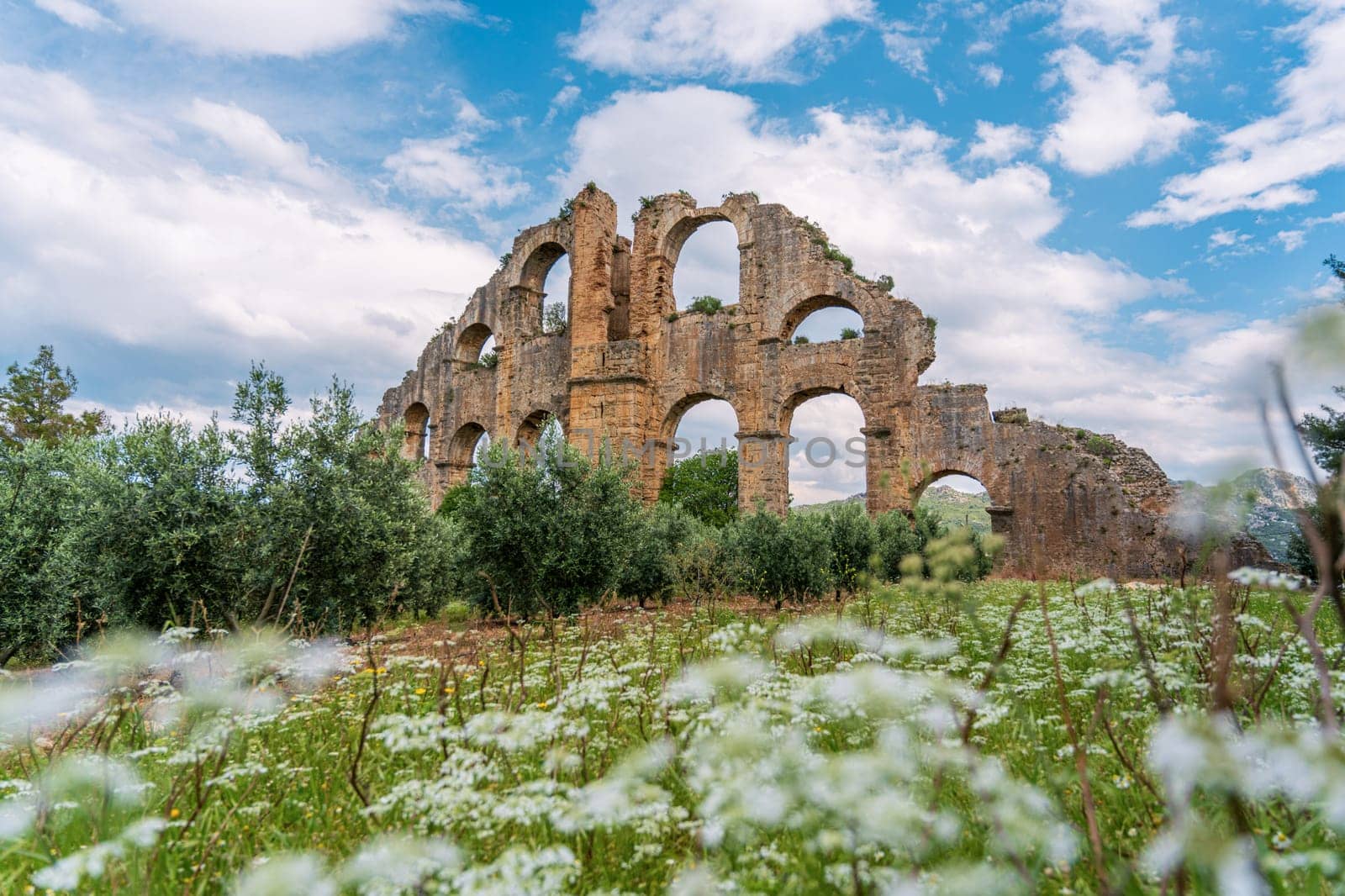 Aqueducts in the ancient city of Aspendos in Antalya, Turkey by Sonat