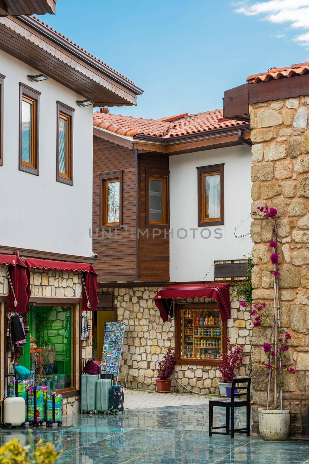 Restored houses with bay windows on the historical streets of Side Antalya