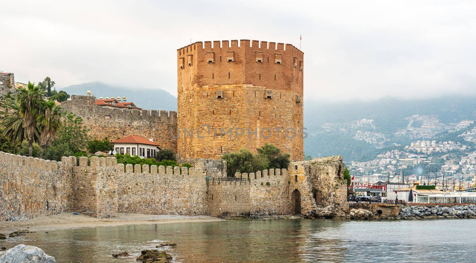 The historical Red Tower in the Alanya district of Antalya, one of the touristic regions of Turkey. Turkish name Kizil Kule by Sonat