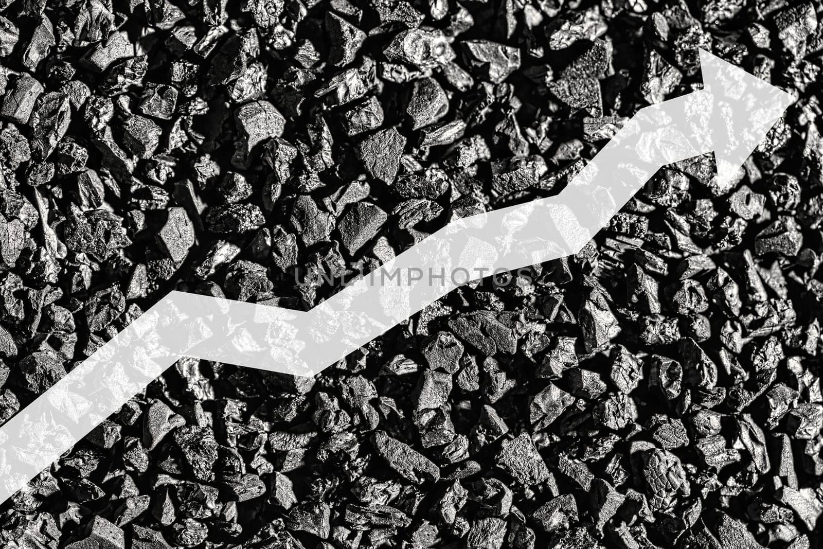 Arrow up on coal background. The concept of price growth, mining, import, export, production or sales of coal. by Eugene_Yemelyanov