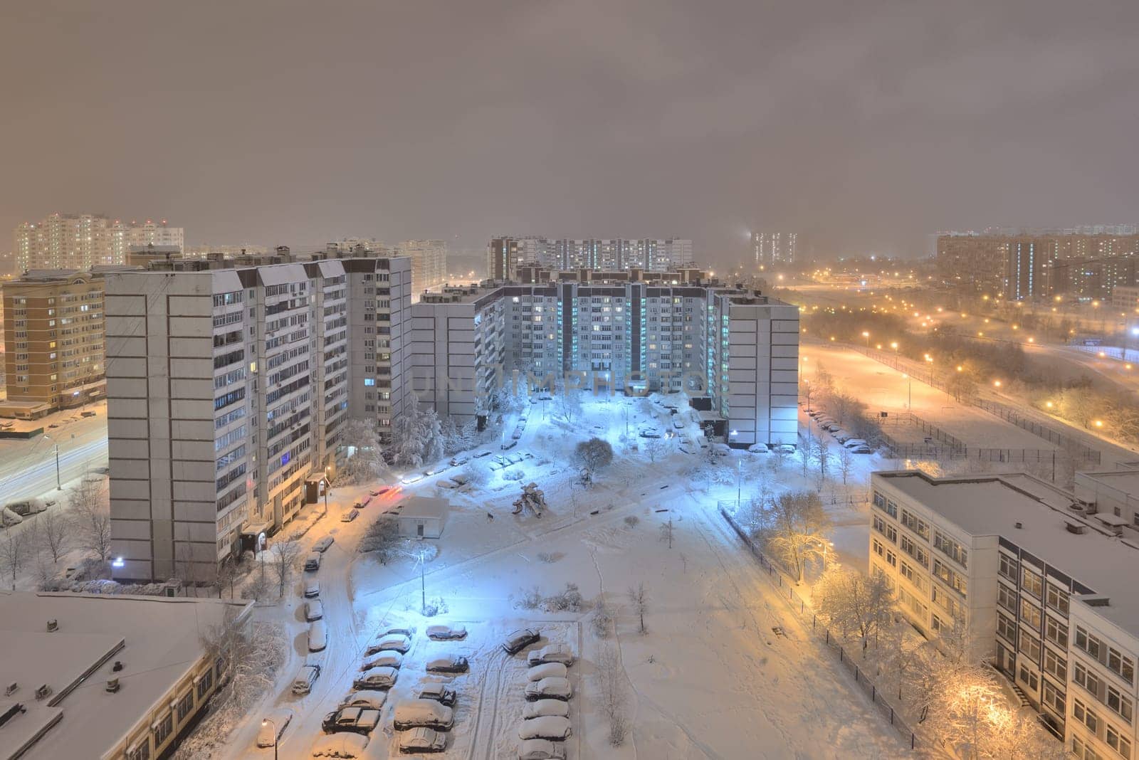 Night city after snowfall in the Moscow, Russia