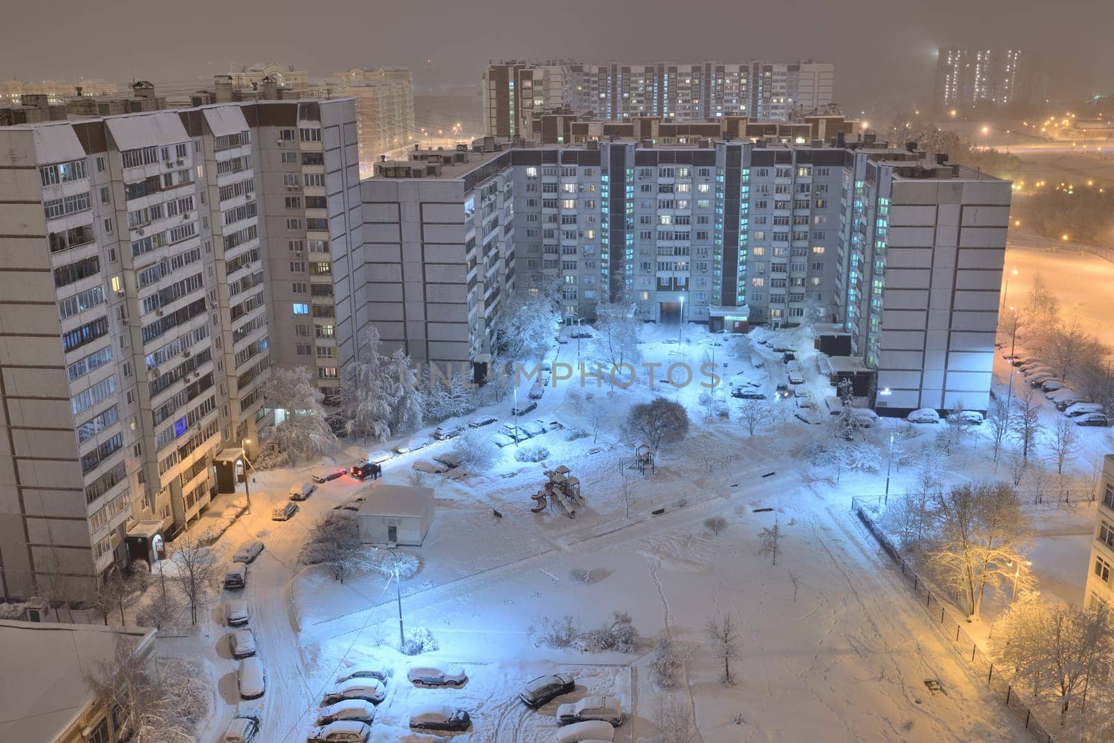 Night city after snowfall in the Moscow, Russia