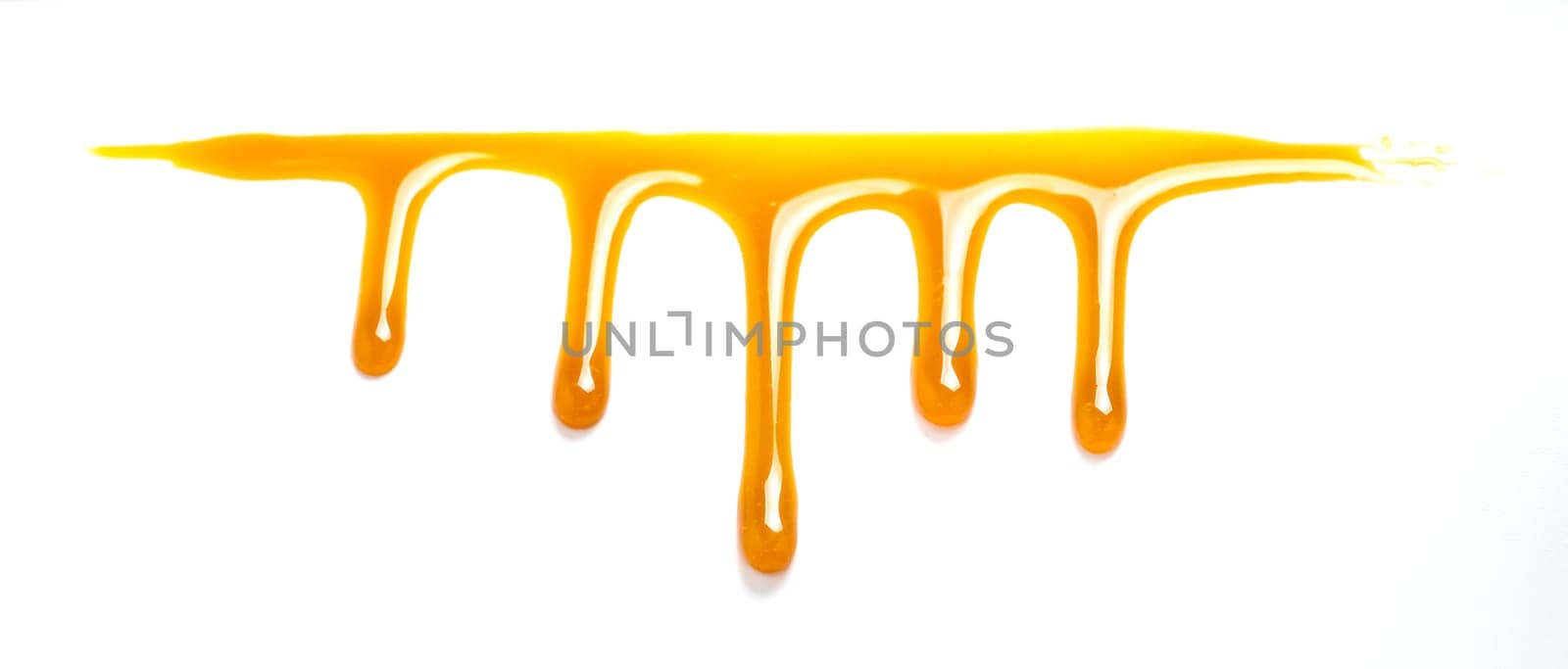 Honey isolated. Flow down honey isolated on white background with clipping path.