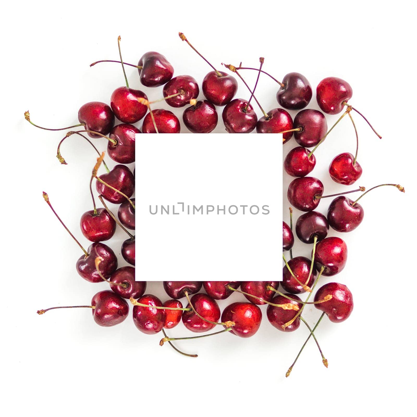 Cherry isolated on white with white square by fascinadora